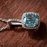 Express Yourself: Natural Blue Topaz and Diamond Halo Silver Necklace