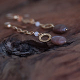 Nourishing the Soul: Peach and Rainbow Moonstone Gold Dangle Earrings
