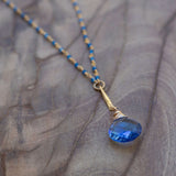 tanzanite and blue chalcedony necklace gold circle pendant