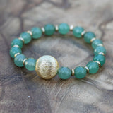 Green adventurine bracelet growth, prosperity, and heart-centered energy.