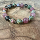 Evolving Light healing gemstone bracelet with Unakite, Ocean Jasper, Smoky Quartz and Strawberry Quartz handmade by Rei of Light Jewelry