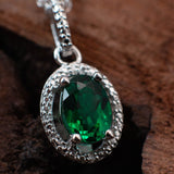 diamond and emerald silver nekclace