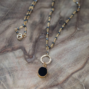 gold necklace with pyrite and onyx