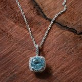 Express Yourself: Natural Blue Topaz and Diamond Halo Silver Necklace