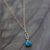 Energy protection necklace with turquoise and clarity enhancing blue topaz