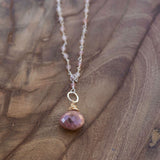 Healing crystal necklace for self worth, emotional balance, and inner strength
Rhodonite gemstone jewelry for releasing past wounds and opening the heart