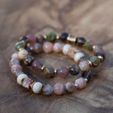 Gemstone bracelet stack for emotional healing, grounding, and heart chakra balance
Handmade beaded bracelet stack with natural stones for growth and transformation