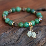 Heart and Soul bracelet featuring Bronzite, Jade, and Prehnite laid beautifully, showcasing healing properties.