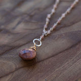 Rhodonite necklace for emotional healing, compassion, and forgiveness
Strawberry quartz and rhodonite necklace for love, balance, and heart healing