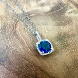 Blue Sapphire and Diamond Halo Pendant Necklace